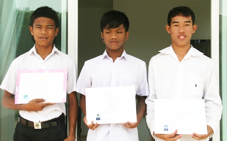 Three young men who are now qualified and looking for work.